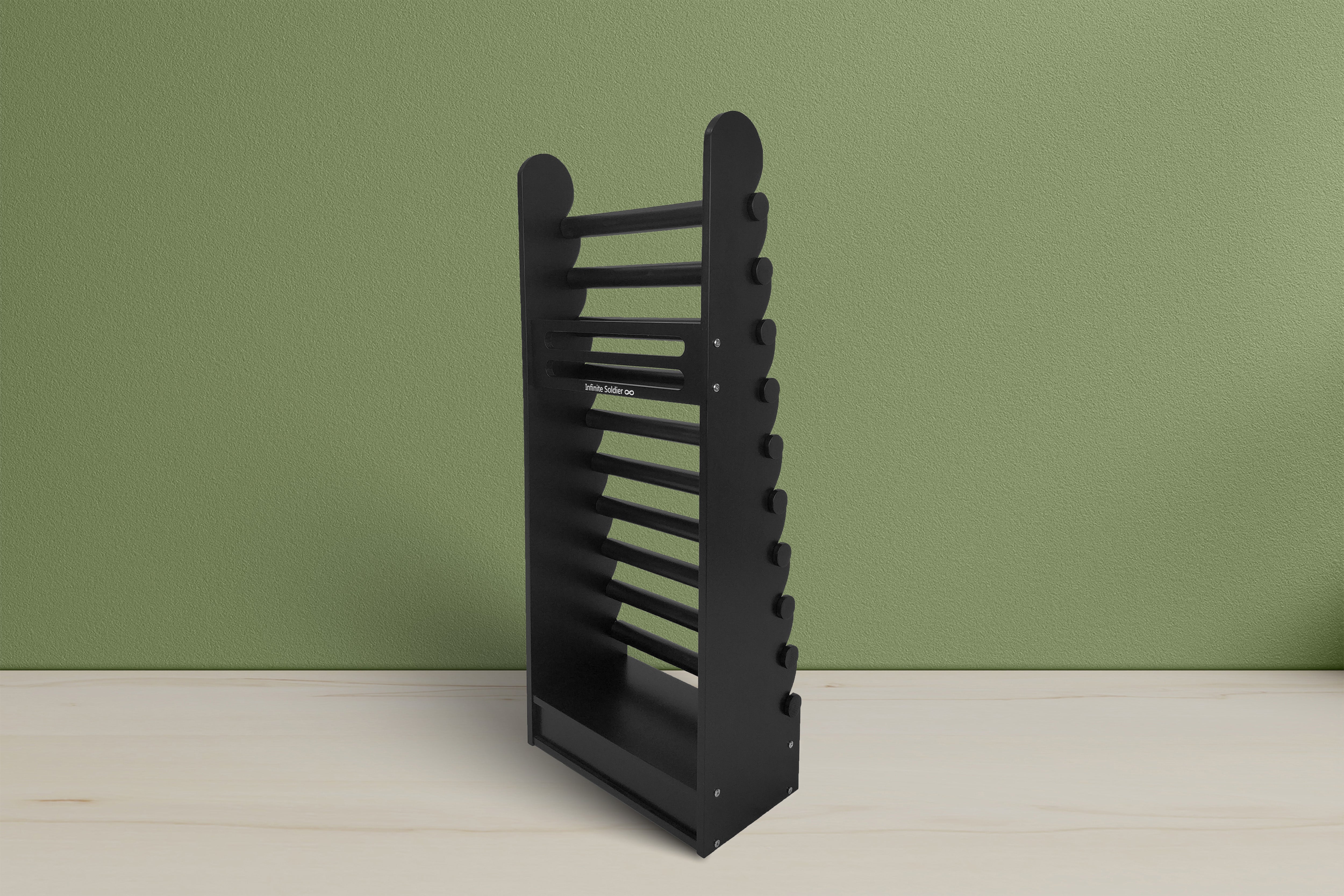 Minimalist black vertical jewelry stand with a contemporary matte finish and hidden drawer for organizing and displaying fine jewelry in premium retail spaces and trade show exhibits.